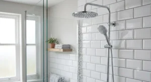 Polished chrome double shower head set installed against classic white metro tiles in a family bathroom.