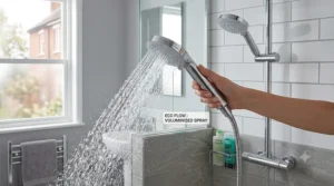 Handheld aerated shower head designed to cut water usage without lowering water pressure