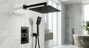 Matte black luxury rain shower head with matching handheld shower attachment and thermostatic mixer controls.