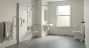 A low-profile walk-in shower enclosure providing easy access and a seamless look in a modern wet room.