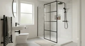 Stylish matt black framed walk-in shower enclosure adding a modern touch to a small bathroom interior.