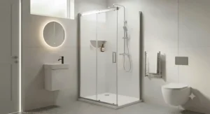 Minimalist sliding door shower cubicle designed to maximise space in a small bathroom