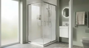 Space-saving corner frameless shower cubicle maximizing natural light in a compact ensuite