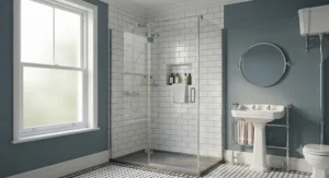 Frameless glass shower enclosure with a smooth pivot door in a Victorian townhouse bathroom