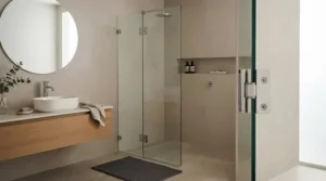 Sleek frameless shower enclosure featuring clear glass and chrome hardware in a contemporary UK home