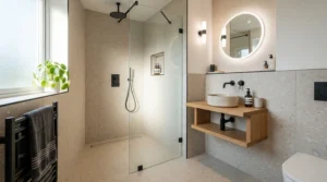 A space-saving shower tray for wet room installation fitted inside a small en-suite bathroom.